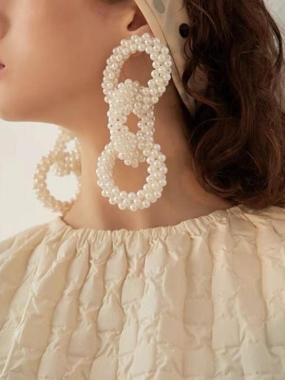 Double circle pearl earrings