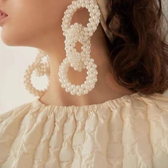 Double circle pearl earrings